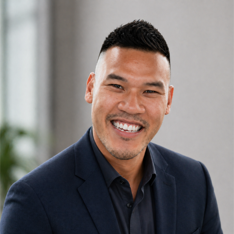 Jonathan Lyn-Shue, Data & AI executive, looking into camera
